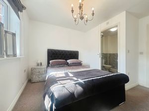 Bedroom One- click for photo gallery